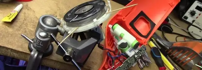 Vacuum cleaner repair parts and tools on a workbench in Portland, OR